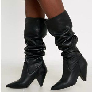 UO knee high slouchy leather boots